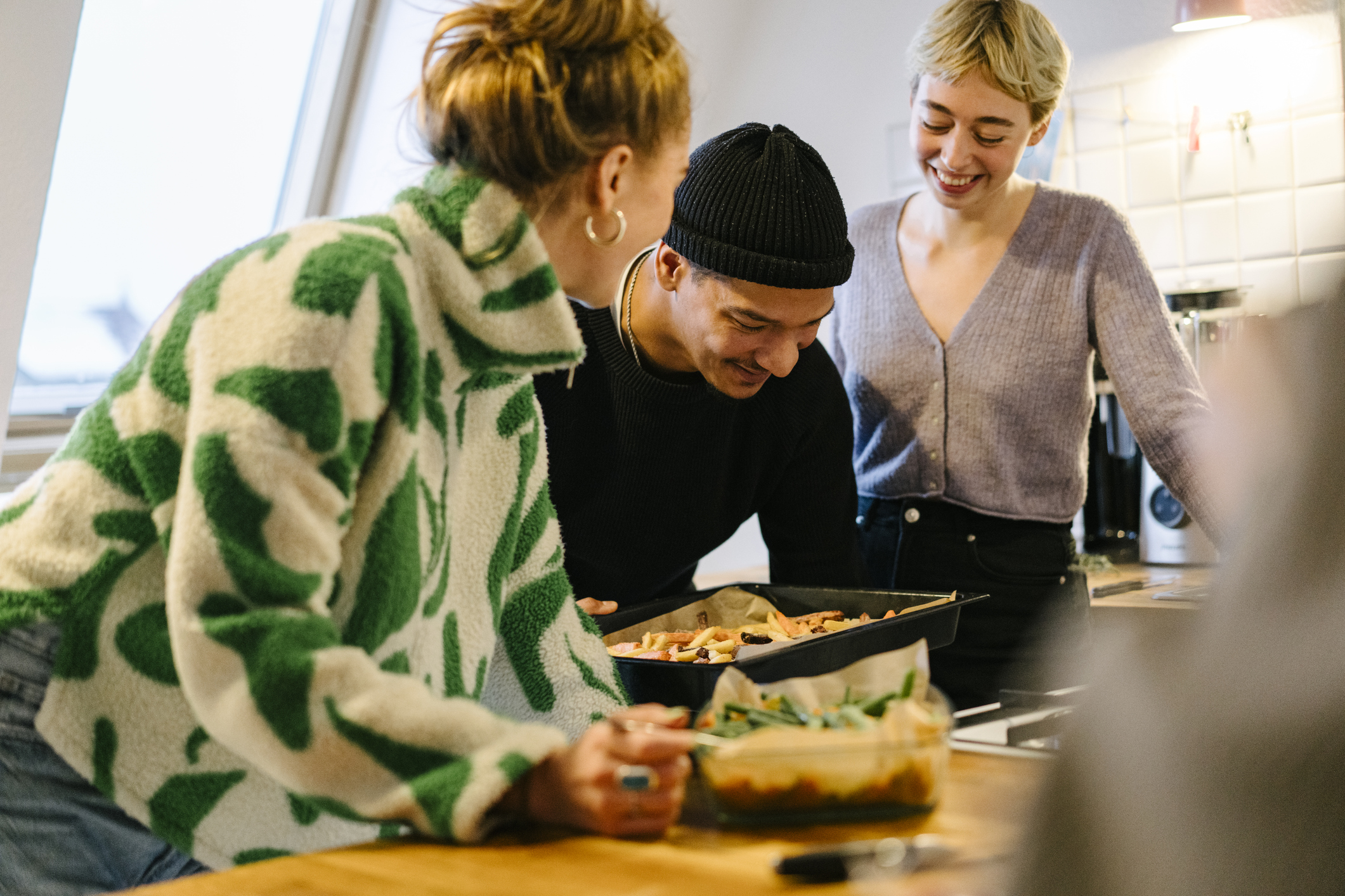 Friends prepare food together